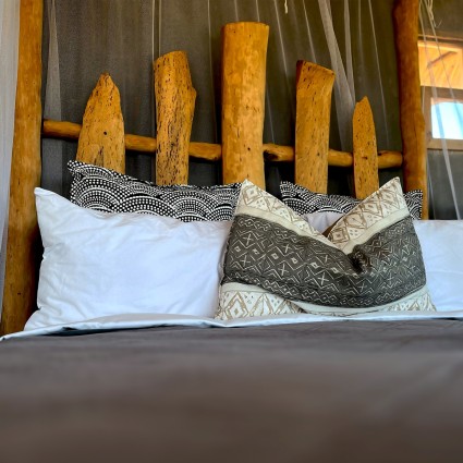 gwango-elephant-lodge-villa-bed.jpg