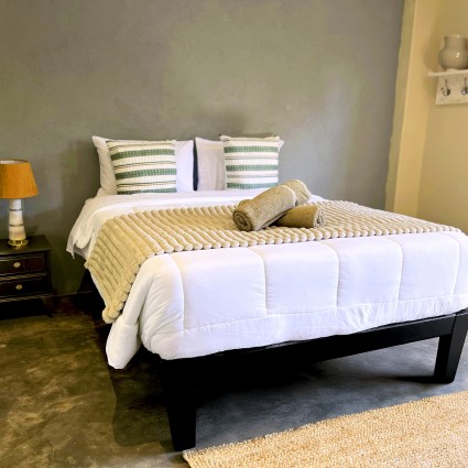 gwango-tamarillo-estate-queen-room.jpg